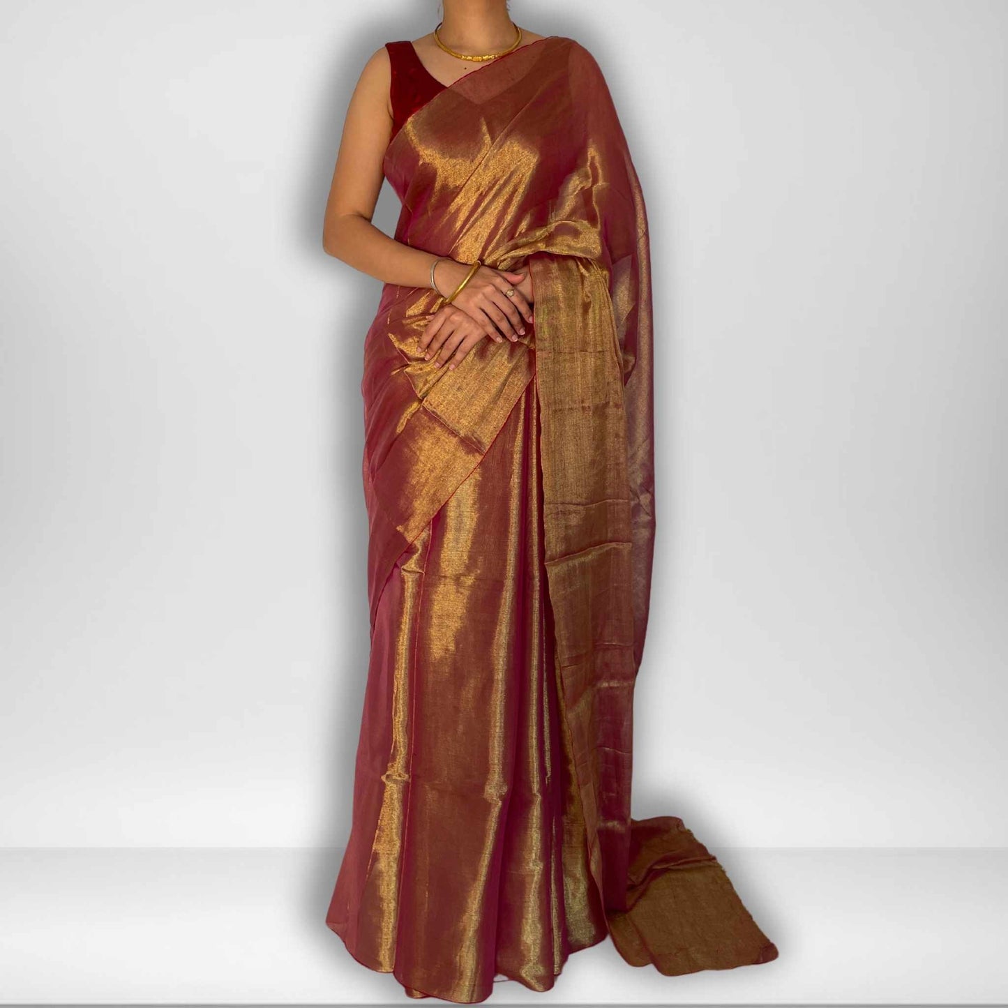 Madhura, Sunset Pink Raga Cotton Tissue Saree with Golden Zari Work by Shobhangini