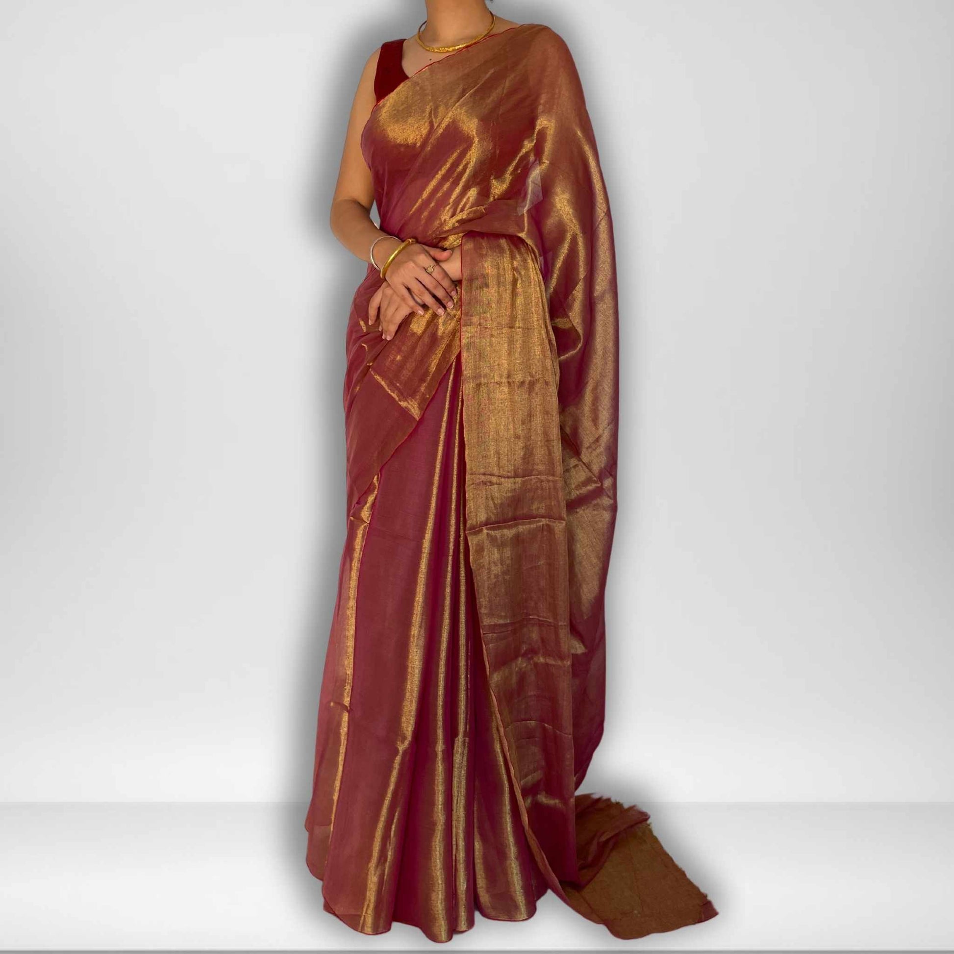 Madhura, Sunset Pink Raga Cotton Tissue Saree with Golden Zari Work by Shobhangini