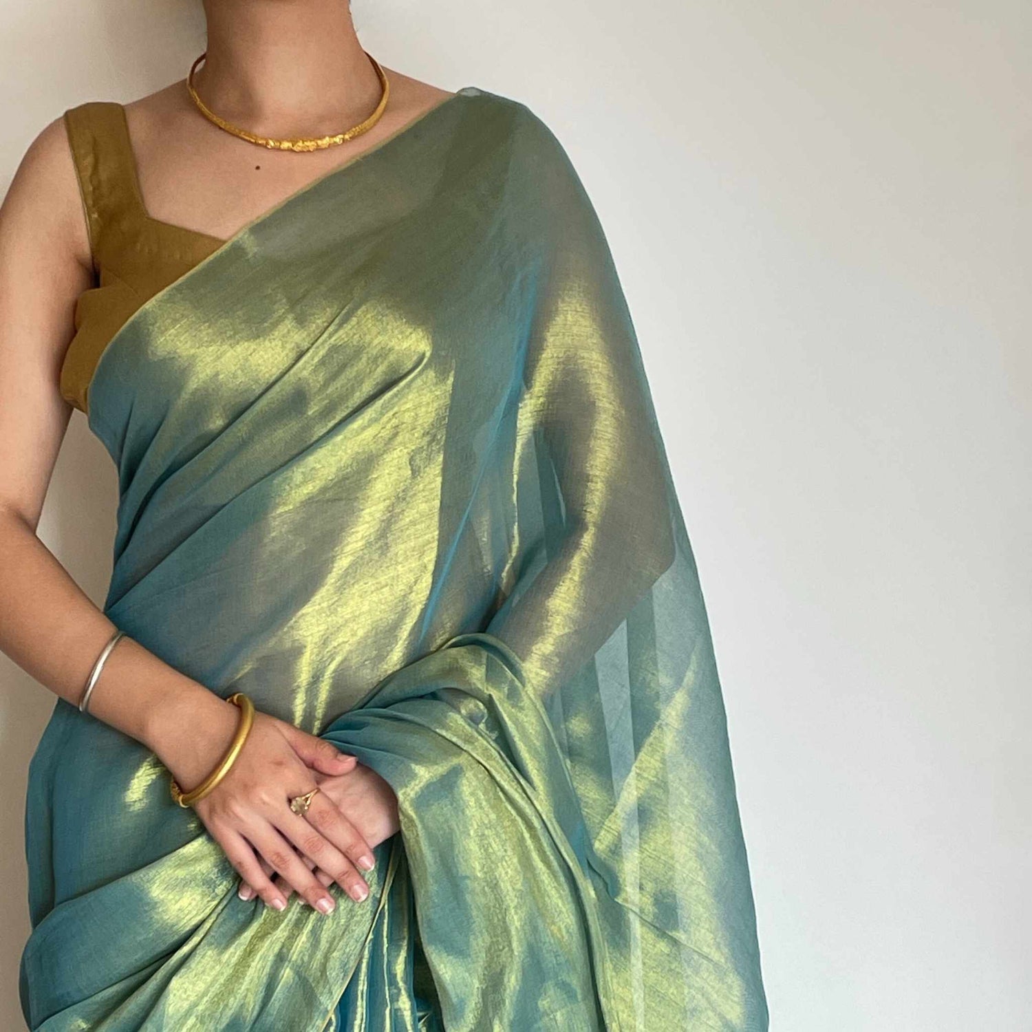 Tarana, Blue Raga Cotton Tissue Saree with Golden Zari Work by Shobhangini